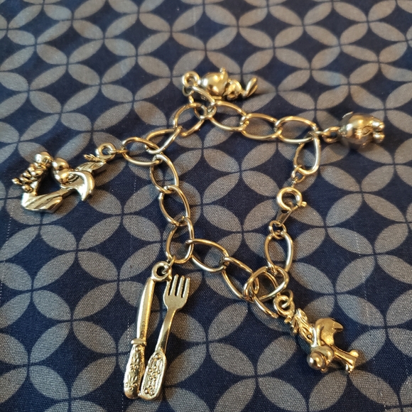 Gold Charm Bracelet with Unique Charms - Picture 1 of 5